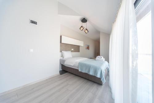 Katil atau katil-katil dalam bilik di Green Hills Suites