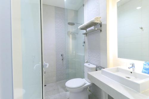 Ванная комната в Hotel Berlian International