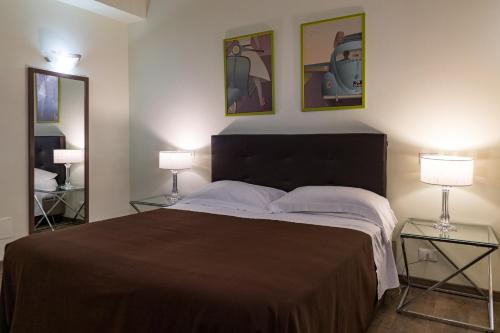 Postel nebo postele na pokoji v ubytování B&B Residenza Gregorio VII