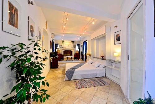 Postel nebo postele na pokoji v ubytování Romantic Rooms Gena