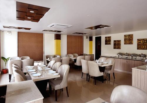 Posezení v ubytování Starz Clarks INN Mussoorie