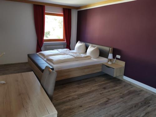 Postel nebo postele na pokoji v ubytování Hotel Oyer Hof - selbst Service