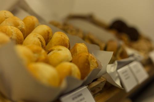 a bunch of donuts sitting on a table at Blanca Hotel in Izmir