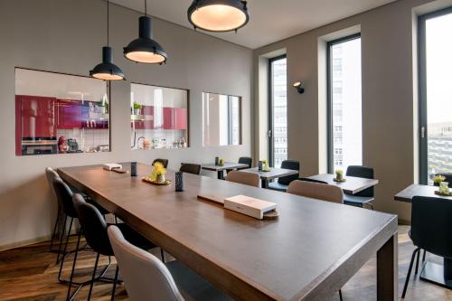 Cuisine ou kitchenette dans l'établissement Aparthotel Adagio Bremen City