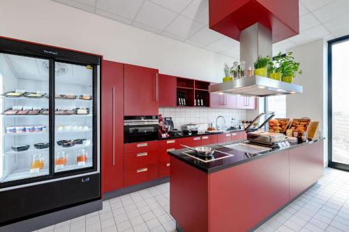 Cuisine ou kitchenette dans l'établissement Aparthotel Adagio Bremen City