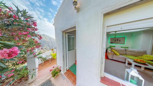 a view of a living room from the balcony of a house at Sweet Home Masca in Masca