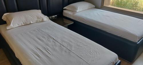 Ένα ή περισσότερα κρεβάτια σε δωμάτιο στο Magnifique appart vue sur golf