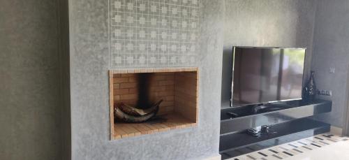 TV a/nebo společenská místnost v ubytování Magnifique appart vue sur golf