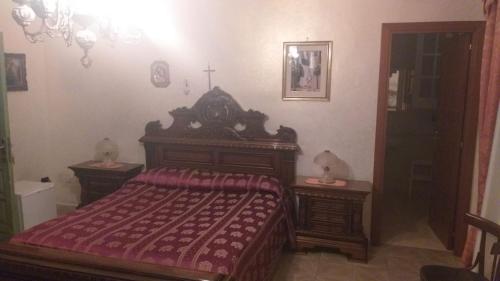 سرير أو أسرّة في غرفة في B&B la Conca Stella