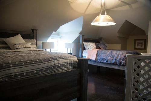 a bedroom with a large bed and a window at Vacation House DC in Washington