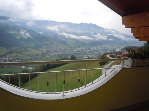 a balcony with a view of a mountain at Haus Heigl in Sankt Johann im Pongau