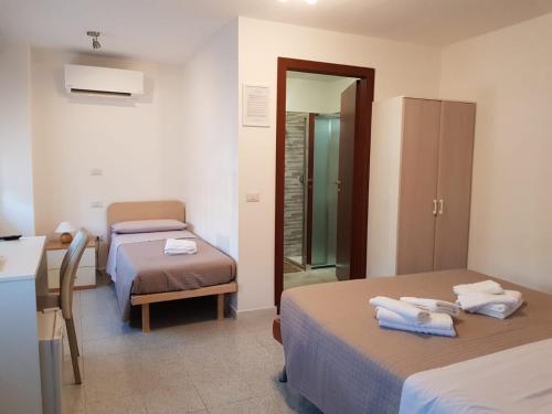 Postel nebo postele na pokoji v ubytování B&B da Mary