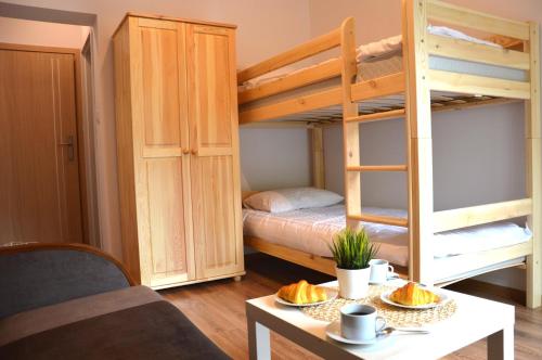 Postel nebo postele na pokoji v ubytování Przystań Park Dolny