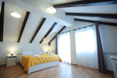 Cama ou camas em um quarto em B&B La Primula