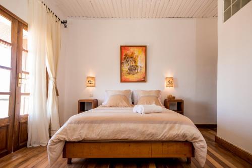 A bed or beds in a room at Maison entière ChezSoa, antananarivo