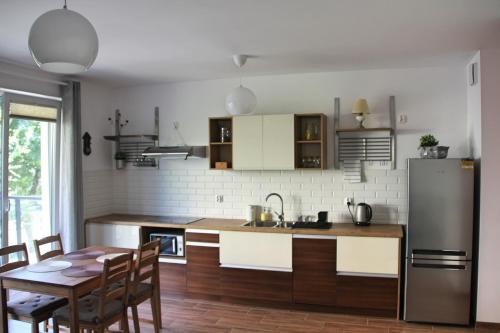 Kuchyňa alebo kuchynka v ubytovaní Apartament Spacerowa