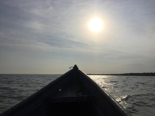 a person riding in a boat on the water at Hotel Mar del Viento in San Bernardo del Viento