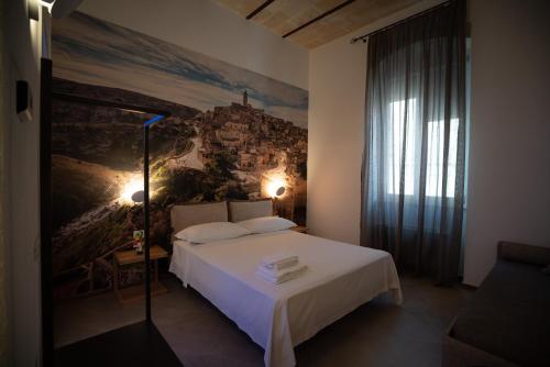 A bed or beds in a room at La Lupa