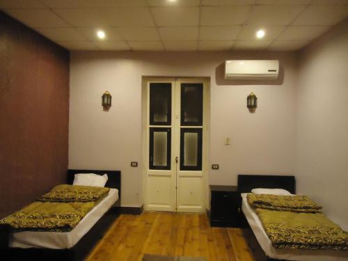 Кровать или кровати в номере Freedom Hostel