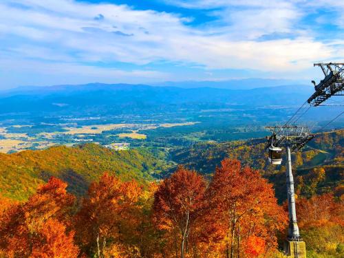 a gondola ride in the mountains in the fall at Lotte Arai Resort in Myoko