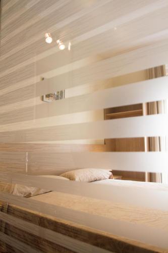 a bedroom with two beds and a window at Hostal Excellence in Barcelona