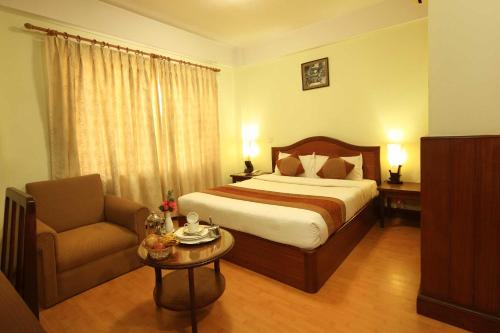 Postel nebo postele na pokoji v ubytování Samsara Boutique Hotel