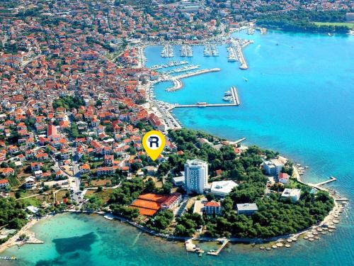 an aerial view of an island with a yellow sign at Refresh Boutique Apartments in Vodice