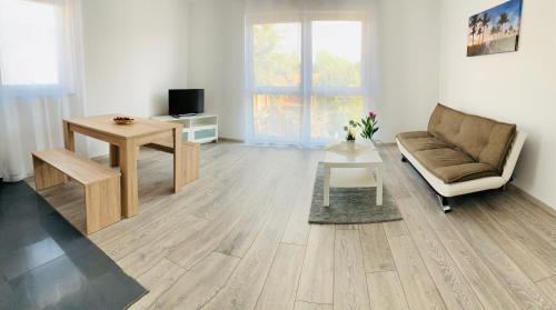Μια τηλεόραση ή/και κέντρο ψυχαγωγίας στο IG-Apartments