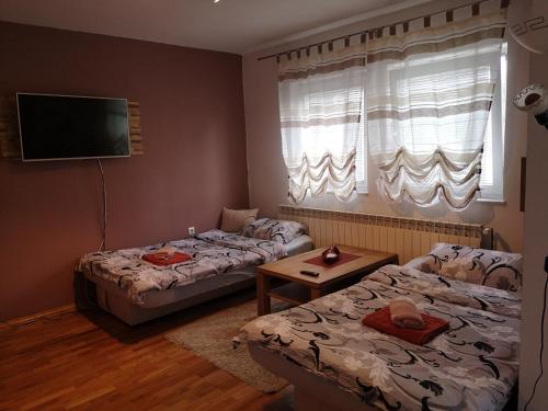 Кровать или кровати в номере Apartment Igor - HOLIDAY HOME