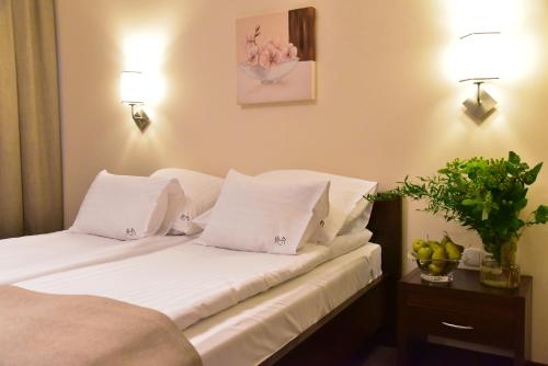 Postel nebo postele na pokoji v ubytování Hotel Hi-Fi Spa