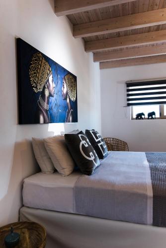 Кровать или кровати в номере Sarpidon Apartments