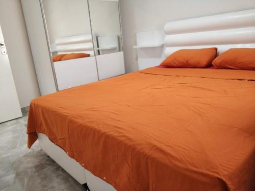 Ліжко або ліжка в номері Oba Suites Apartmani