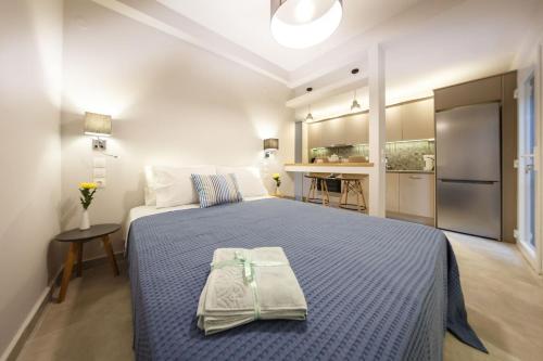 A bed or beds in a room at Plession Apartment