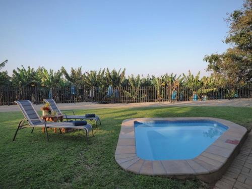 Swimmingpoolen hos eller tæt på Poinsettia family Cottage