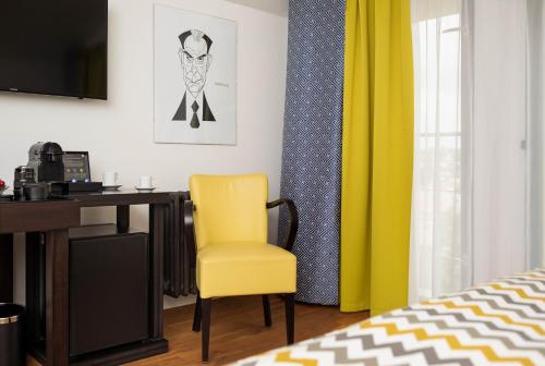TV a/nebo společenská místnost v ubytování Bellevue Hotel Benešov