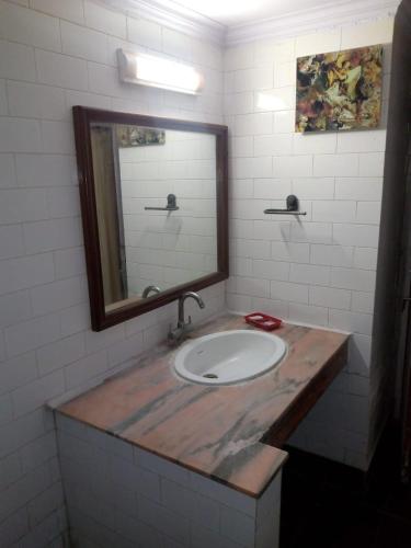 Ванная комната в Hotel Ganga Ratan