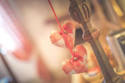 a pair of shoes hanging from a light pole at Agriturismo Selvella in Radicofani
