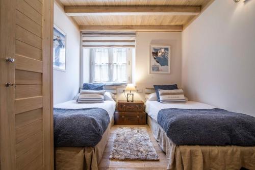 מיטה או מיטות בחדר ב-FLOC DE NEU de Alma de Nieve