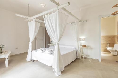Postel nebo postele na pokoji v ubytování Elune B&B