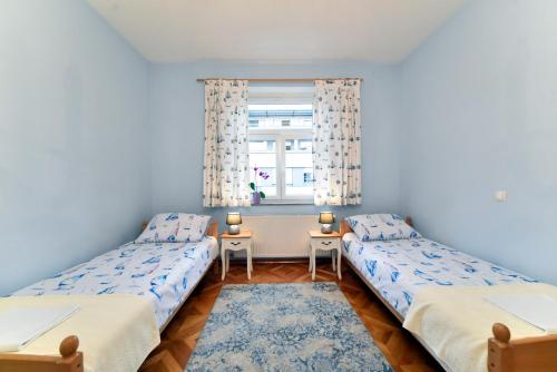Postel nebo postele na pokoji v ubytování Apartment Tatjana
