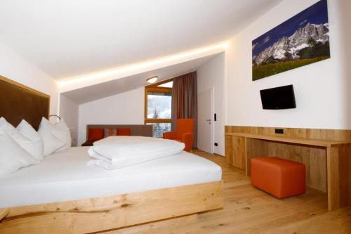Ein Bett oder Betten in einem Zimmer der Unterkunft Hotel Park