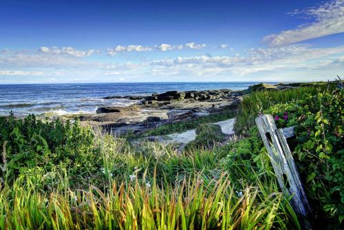 a view of the ocean from a beach at Overleaf Lodge and Spa in Yachats
