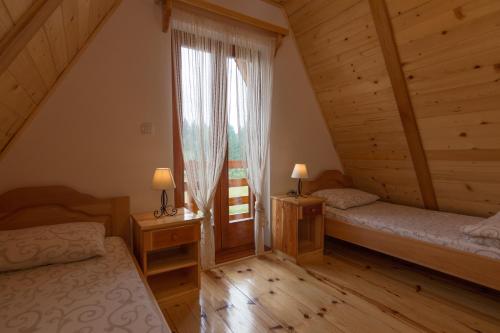 Un ou plusieurs lits dans un hébergement de l'établissement Mountain house Popović Tara