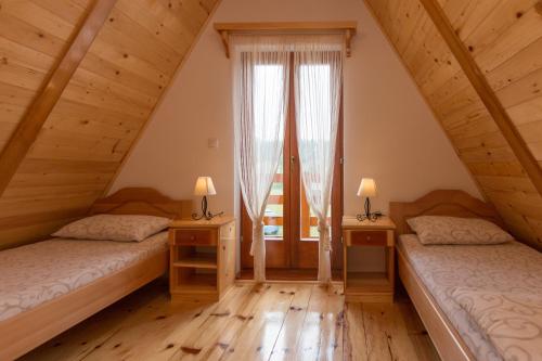Un ou plusieurs lits dans un hébergement de l'établissement Mountain house Popović Tara