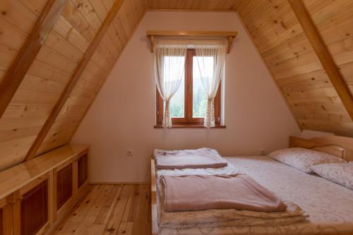 Un ou plusieurs lits dans un hébergement de l'établissement Mountain house Popović Tara
