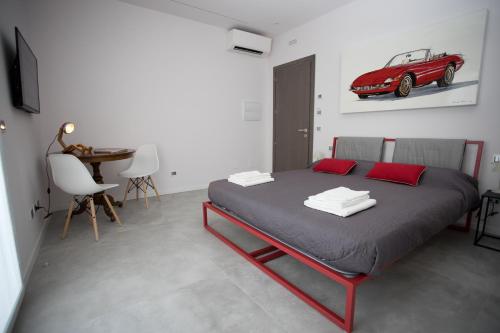 Postel nebo postele na pokoji v ubytování Casa Elisa Dimora Urbana