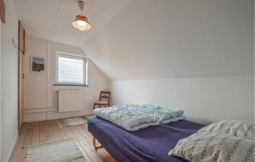 Un pat sau paturi într-o cameră la 5 Bedroom Gorgeous Home In Bredebro