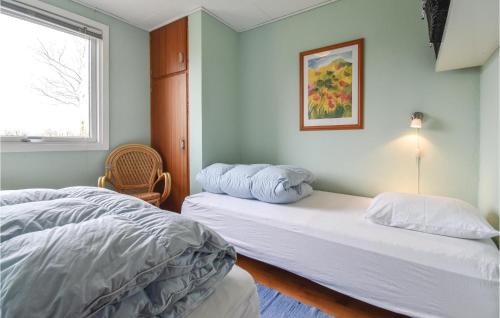 מיטה או מיטות בחדר ב-Fyrrehuset