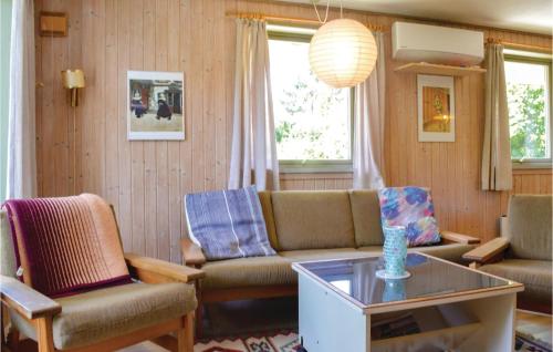 Posezení v ubytování Two-Bedroom Holiday Home In Jagerspris