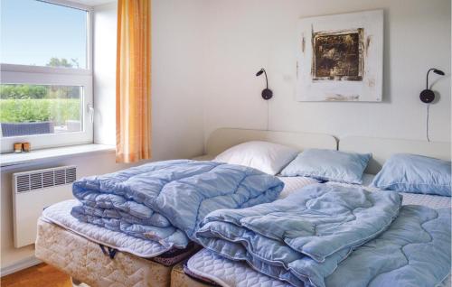 Cama o camas de una habitación en Hjrnet